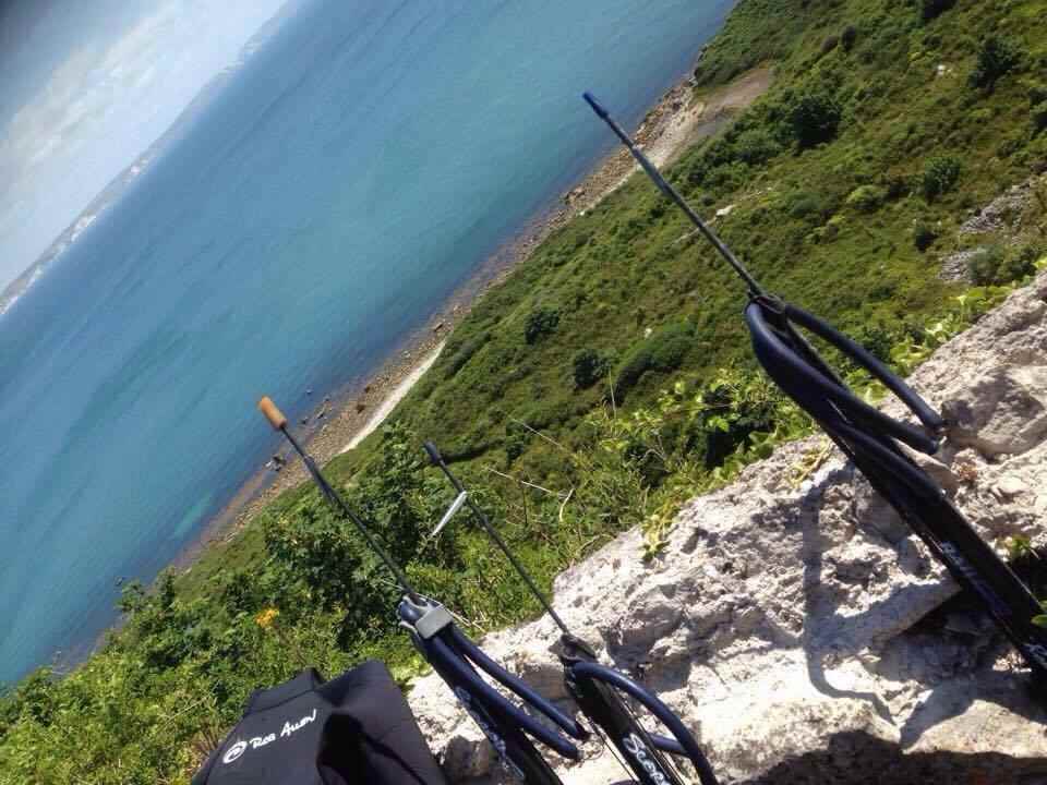 Spearguns on the coastline